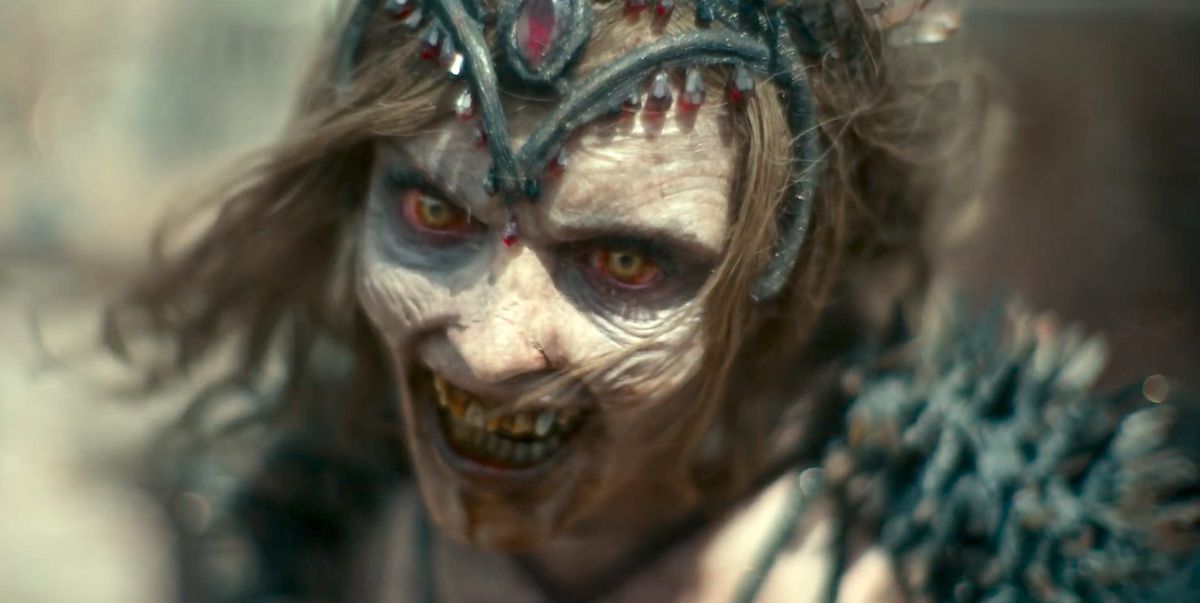A zombie Vegas dancer growls in close-up in Army of the Dead