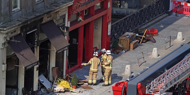Firefighters at the scene after a fire at the Elephant House Cafe in Edinburgh, Wednesday, Aug. 25, 2021. An Edinburgh cafe where author J.K. Rowling wrote some of the <a href='http://www.movierental.com/link/potter'>Harry Potter</a> books has been damaged in a fire. The Elephant House in the Scottish capital was blackened by a blaze which broke out at the patisserie next door on Tuesday.
