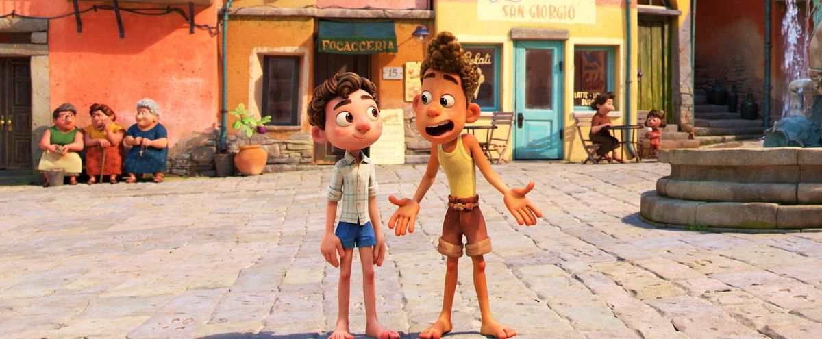 Two cartoon boys stand in a town square.