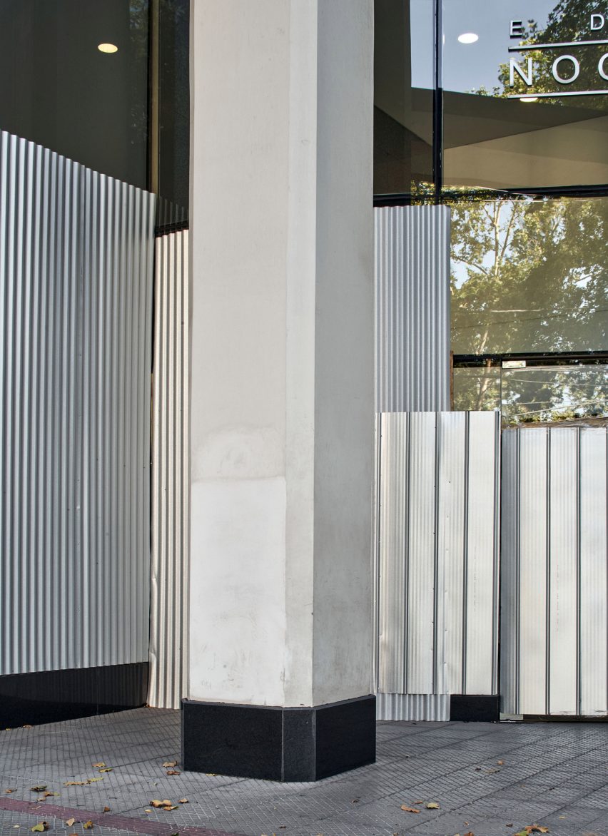 Silver metal covers glass windows and doors