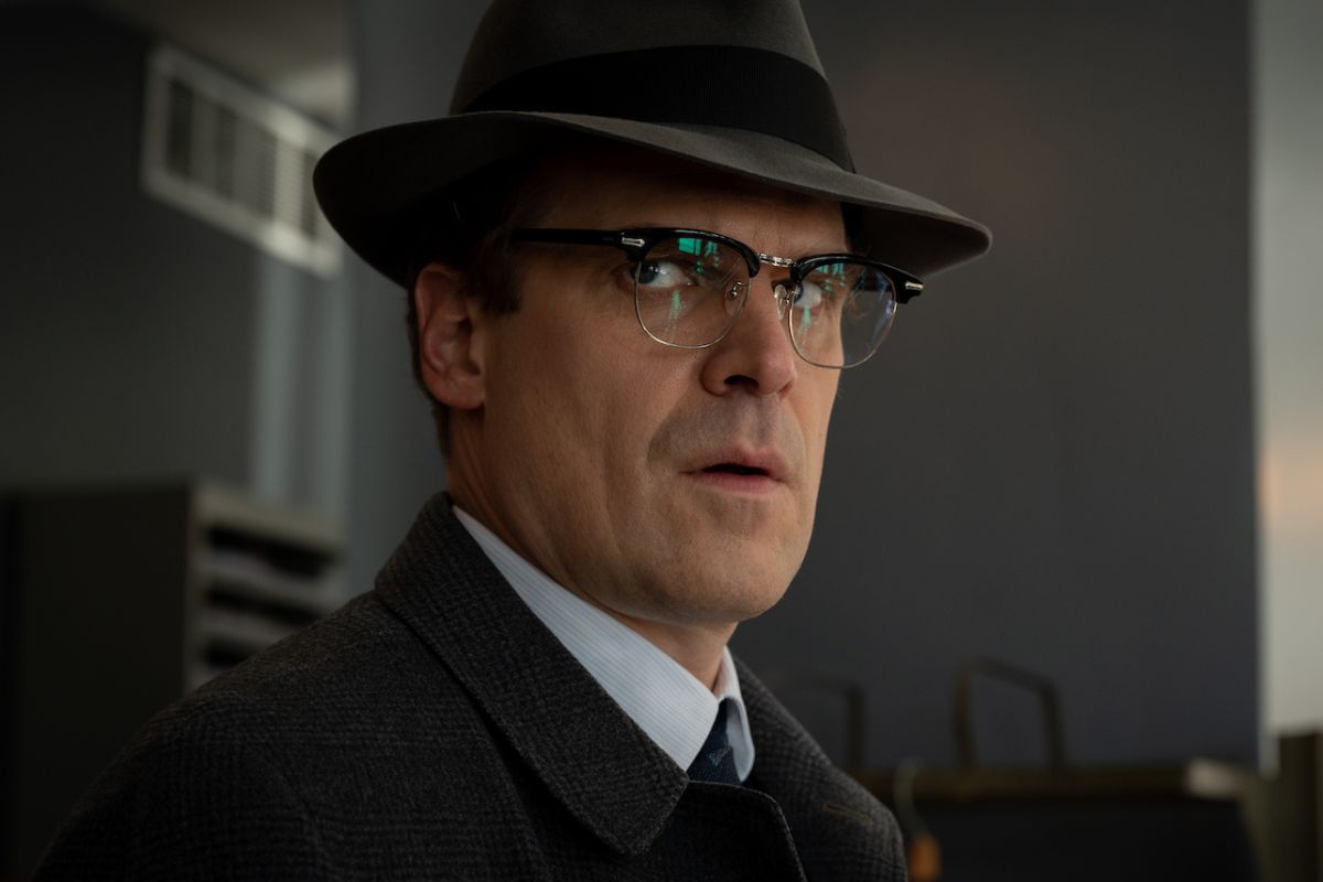 A picture of David Harbour wearing a hat from the 1950s.