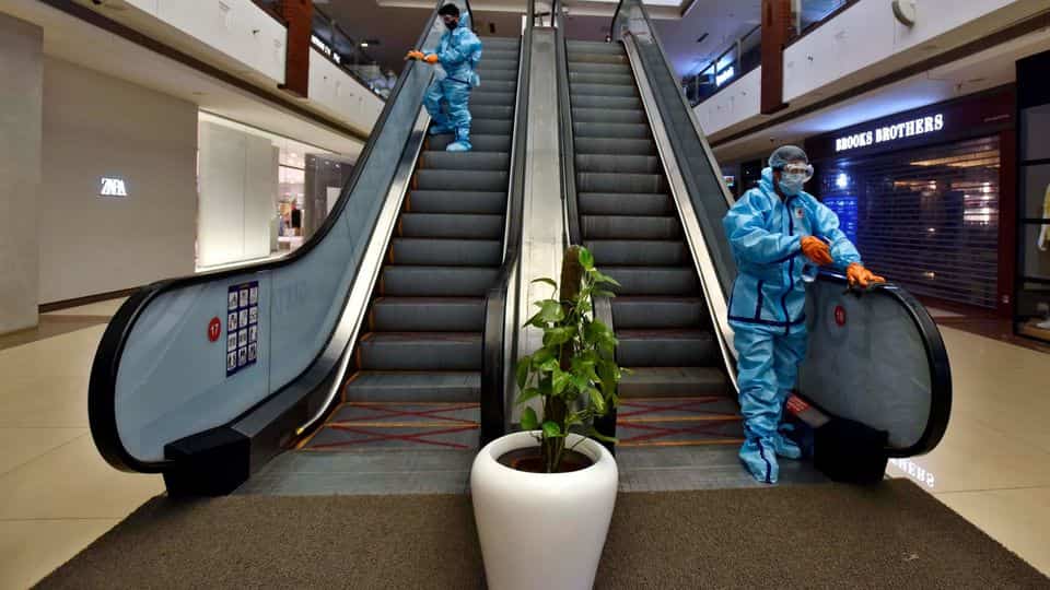Sanitization work underway at Select Citywalk mall ahead of its reopening tomorrow, in Saket, New Delhi.