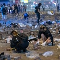A close up image of the Hong Kong protesters laying down their Brick Arches
